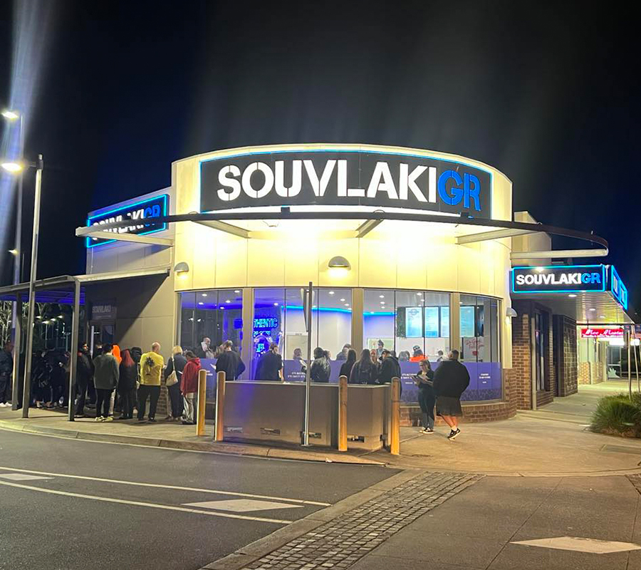 Photo of the Souvlaki GR Packenham location shopfront with line up of customers out the door