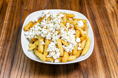 Chips in bowl with feta on top